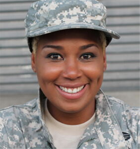 A portrait of a woman wearing military fatigues